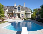Luxury Estate Home backyard facing pool, and back view of home