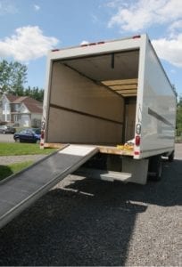 Back view of moving truck with loading ramp down