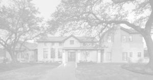 Faded black, and white photo of a 2 story home